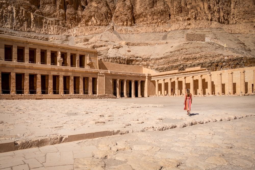 Girl,Walking,In,Front,Of,The,Temple,Of,Hatshepsut,Luxor
