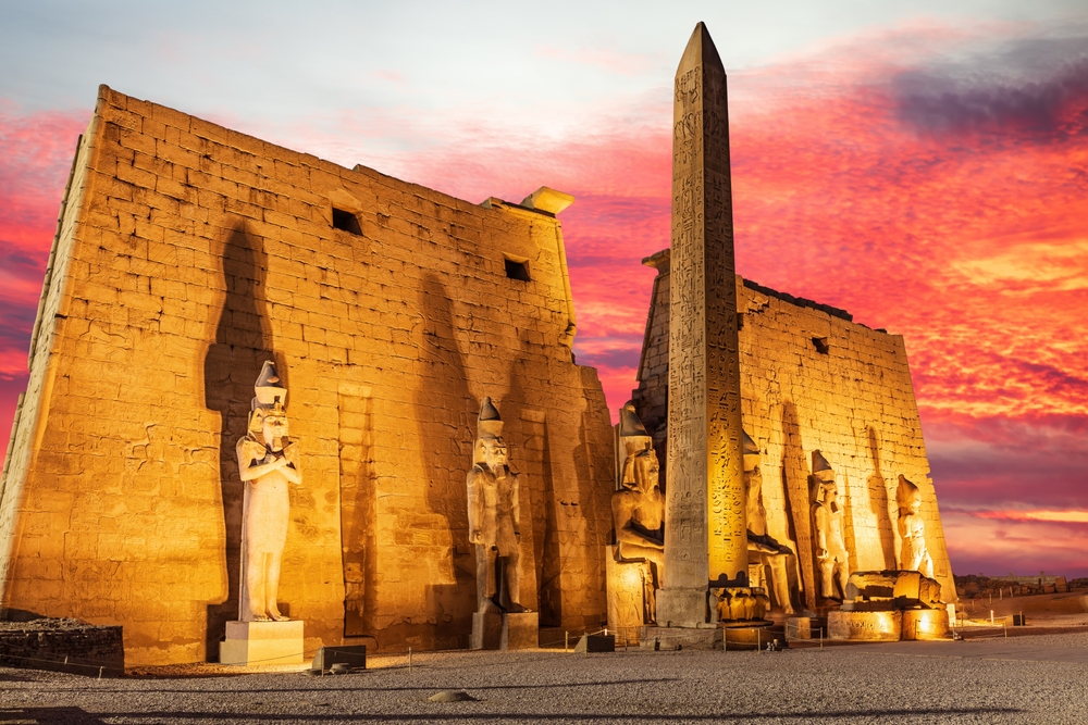 Luxor,Temple,Entrance,,First,Pylon,With,Obelisk,,Sunset,,Egypt